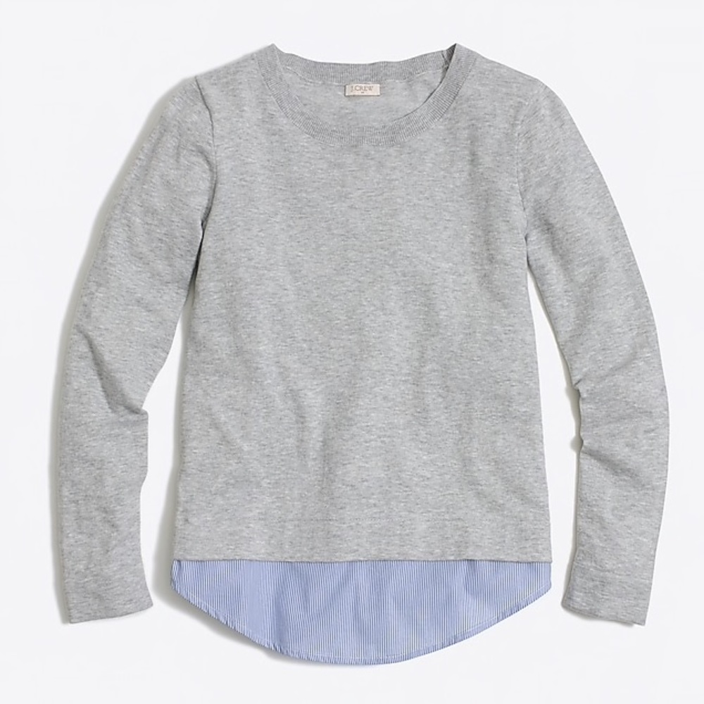 Sweater with woven hem
